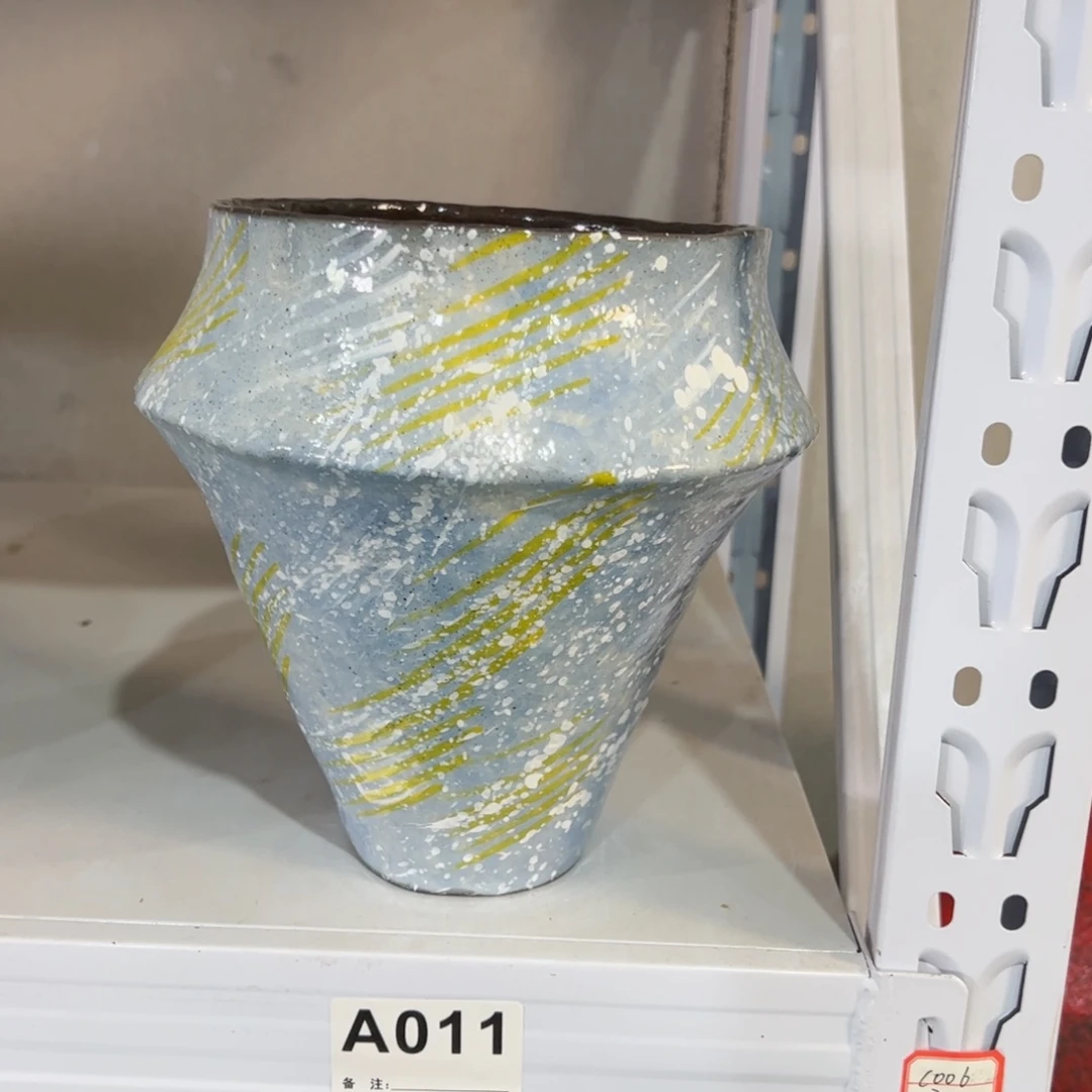 红陶口14高19有孔