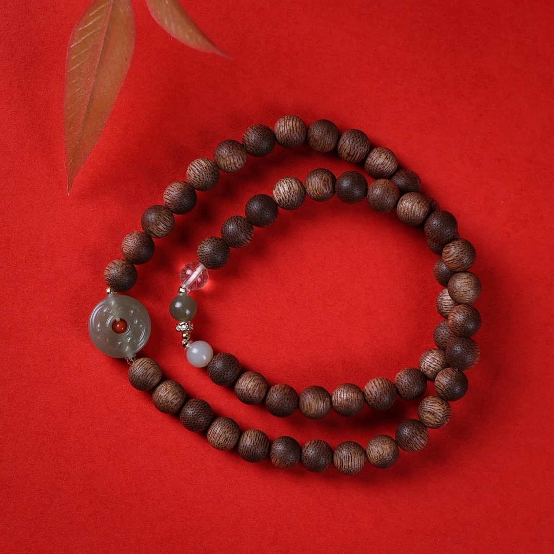 沉香【重华岁贡】-香港黄棋楠0.7双圈+回纹平安扣（多样性发其一）