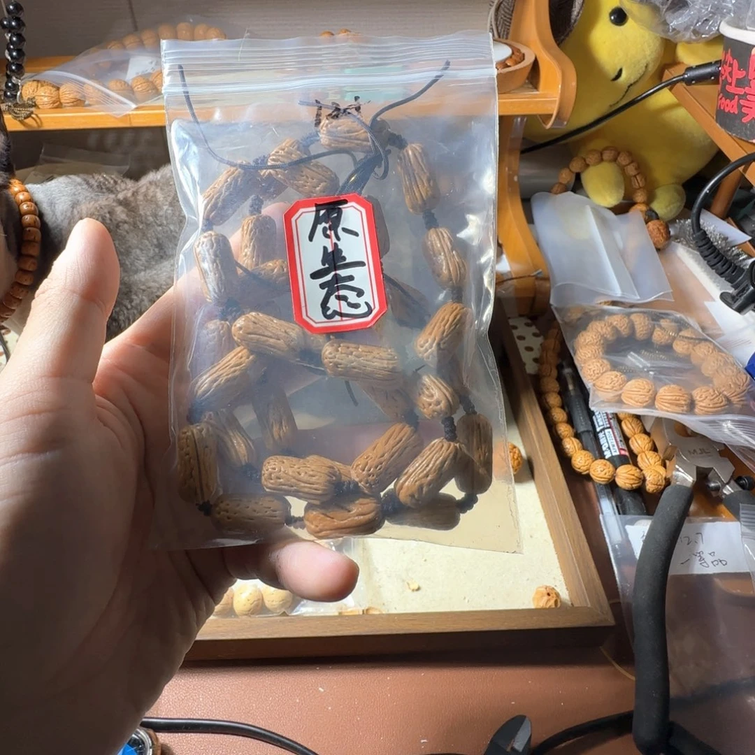 陳***.把件桃核盘锦核金箍棒