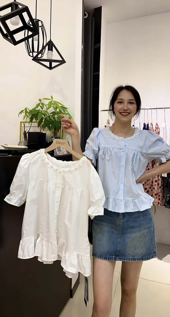 背带式无领夏季无袖一粒扣连衣裙设计感泡泡袖假两件法式白色休闲