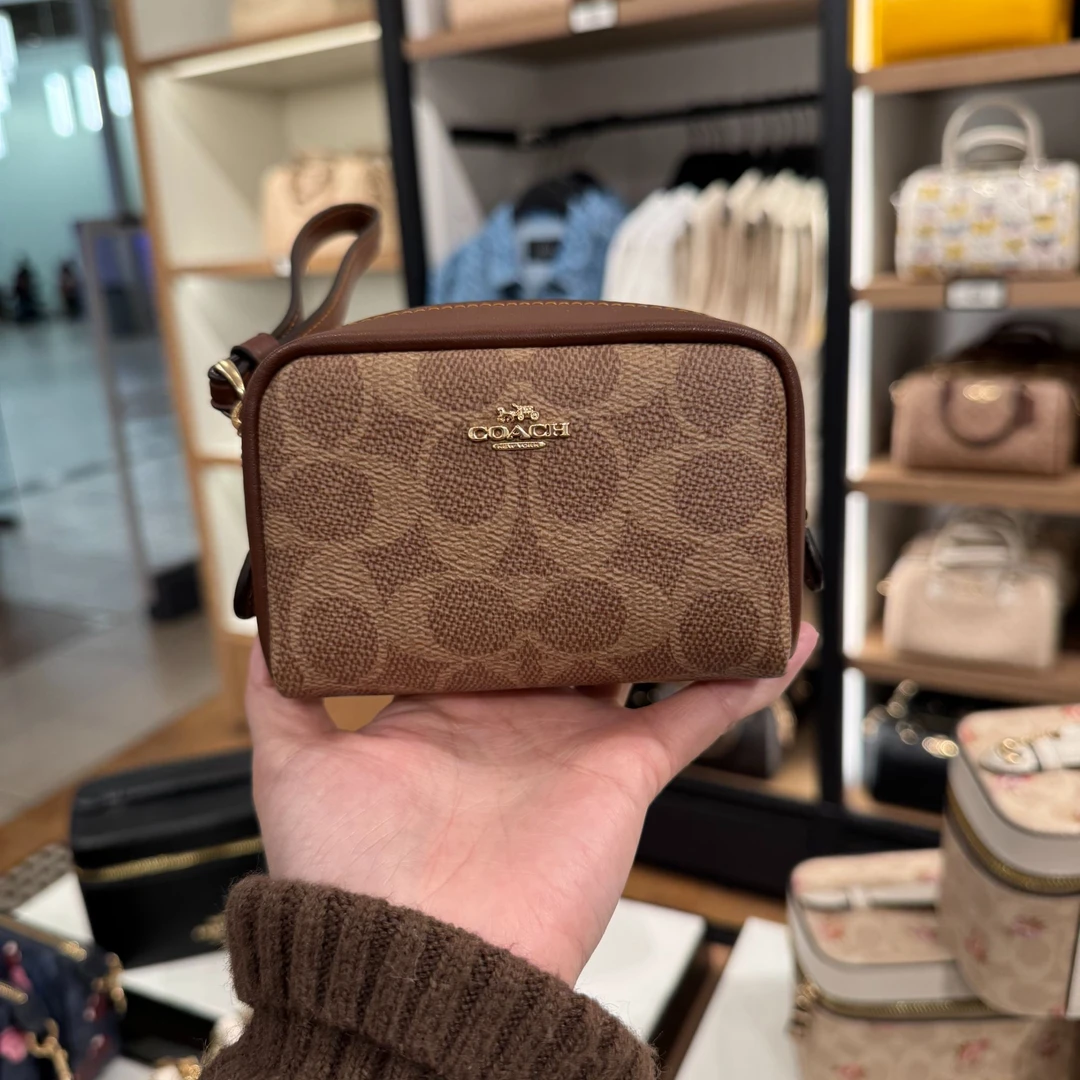 COACH蔻驰棕色logo手腕包手拿包CW907 IMXHE（11*5*8）