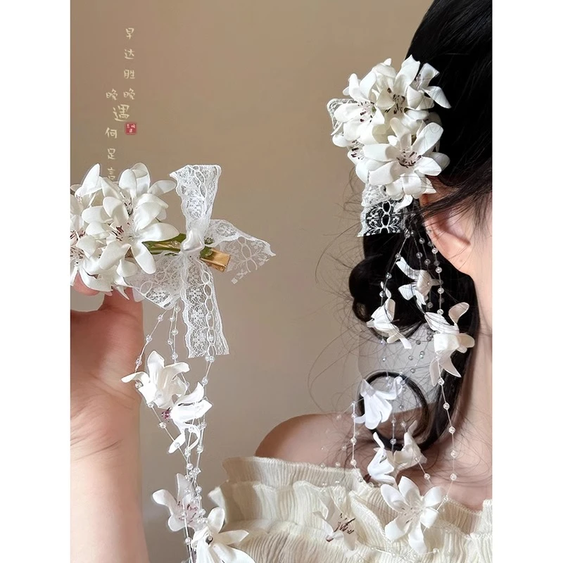 新中式古风仿真铃兰花朵发夹女森系氛围感流苏侧边夹仙女盘头发饰
