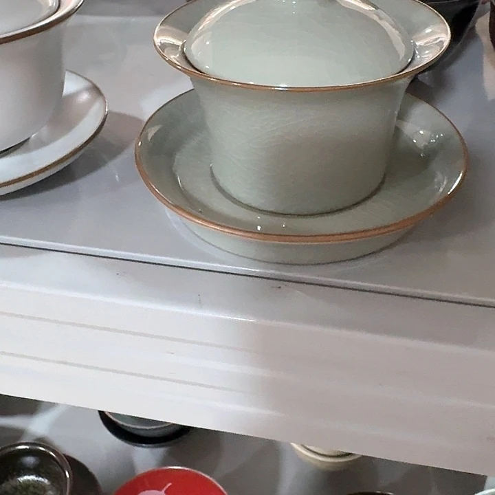 主人杯一个瓷。。品茗