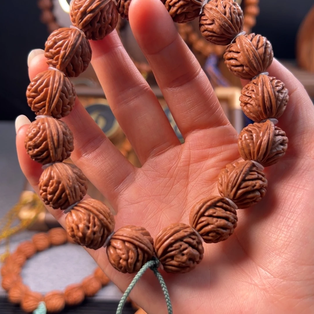 拒***冰吊坠桃核17刺龙元宝