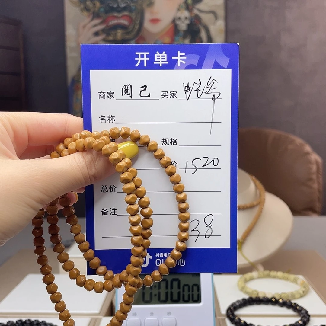 蛙***爷橄榄核手串核尖长串