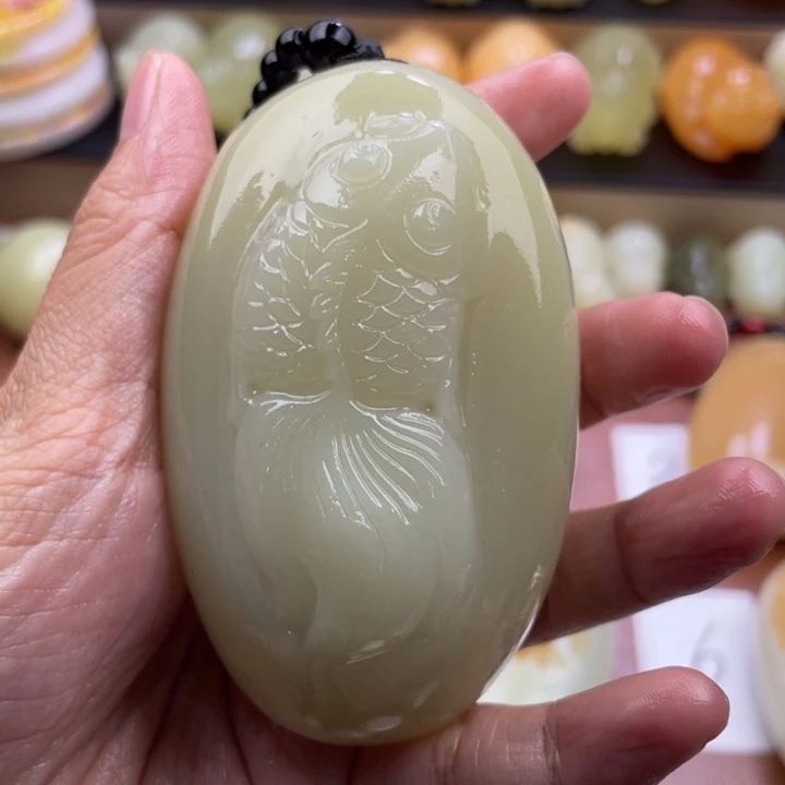 T***.石材古青石手把件