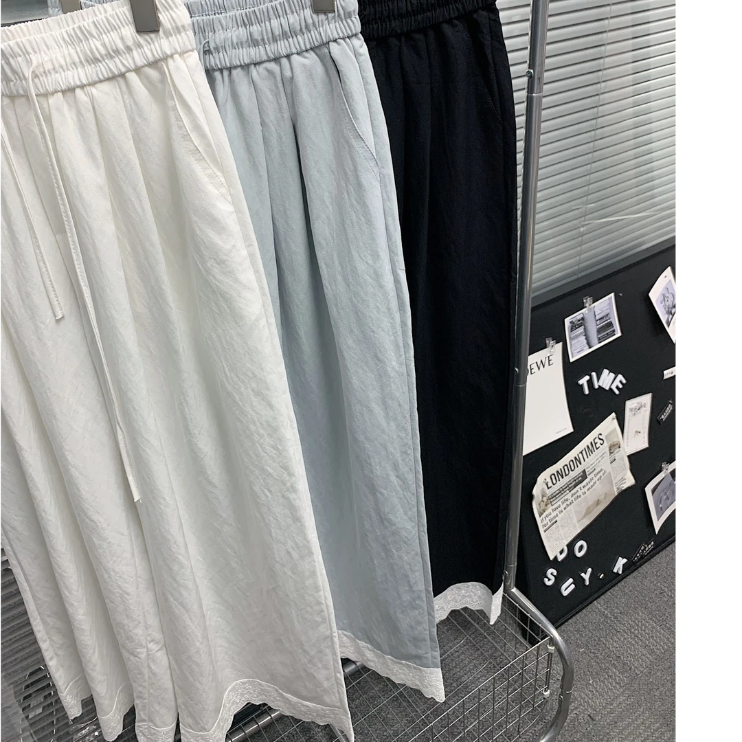 okk!简约显瘦松弛感蕾丝拼接下摆阔腿直筒裤女