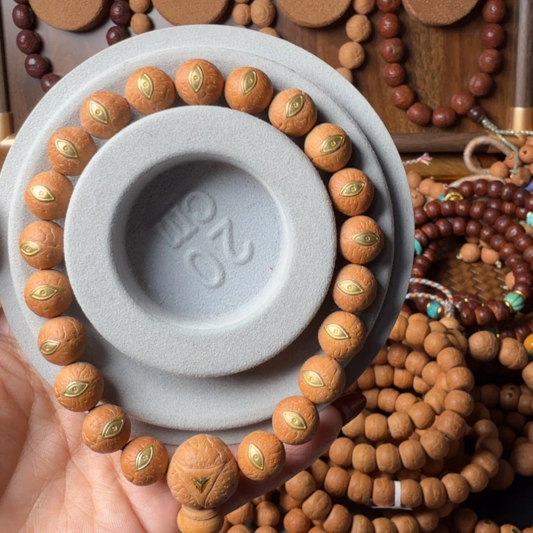 把件凤眼菩提镶嵌法螺眼