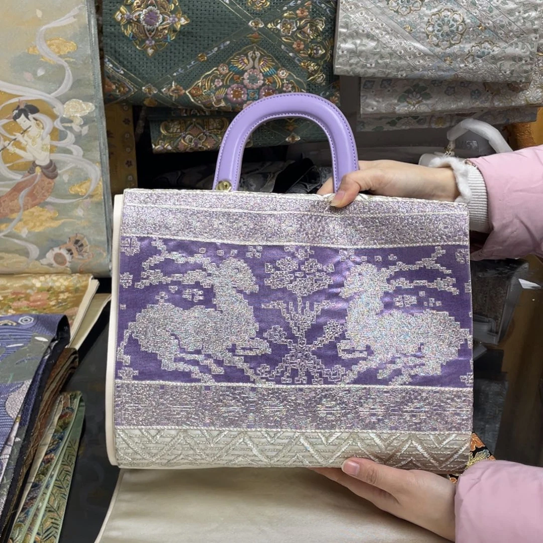 肖***育织绣唐锦西阵织