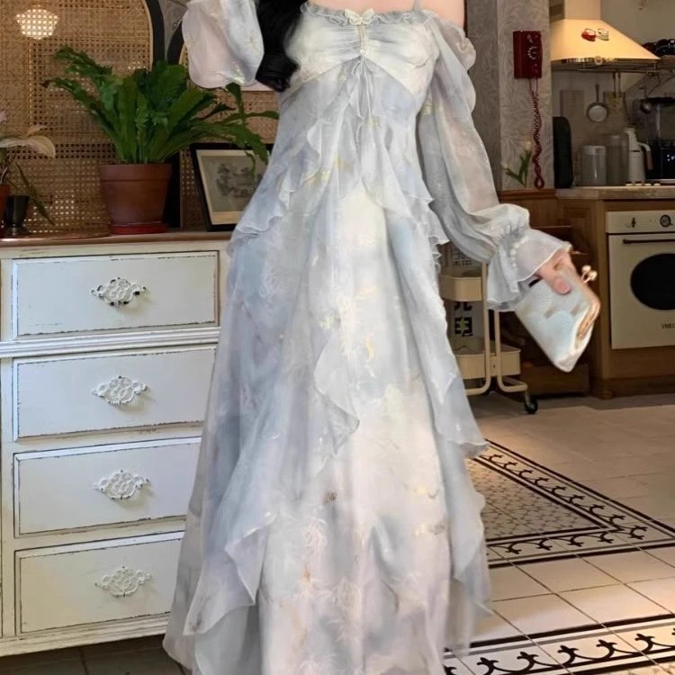 法式度假海边气质蓝色晕染仙气2025夏新款蝴蝶烫金荷叶长袖连衣裙