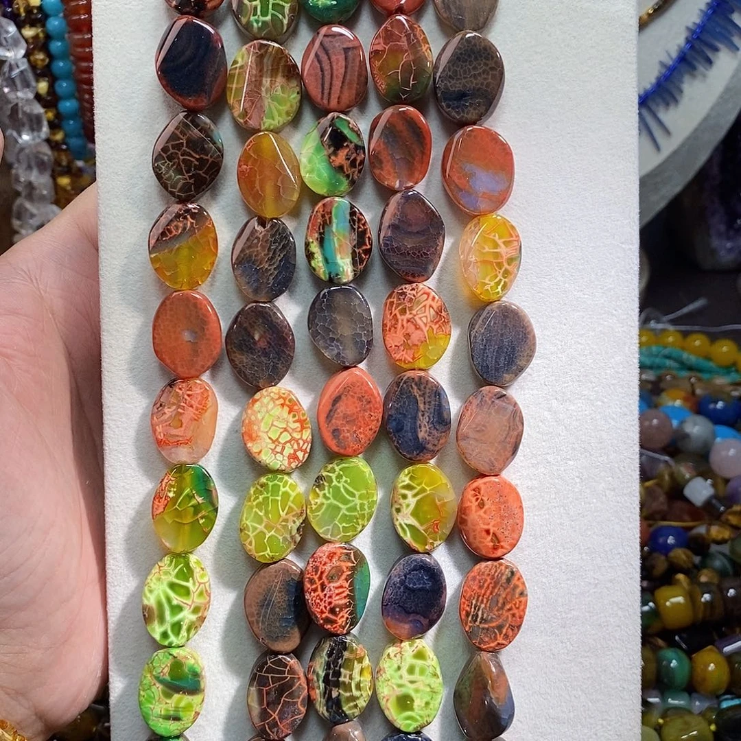 石英质玉未镶嵌，孔雀玛瑙扭扭片16×21mm，