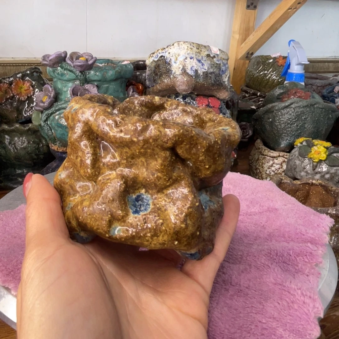 红陶L***?粗砂陶手工花盆