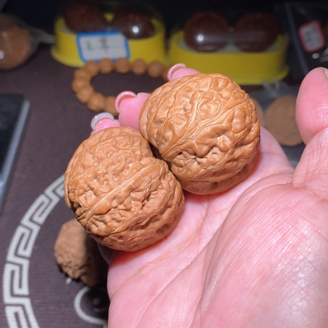 文玩核桃把件摘****食元宝