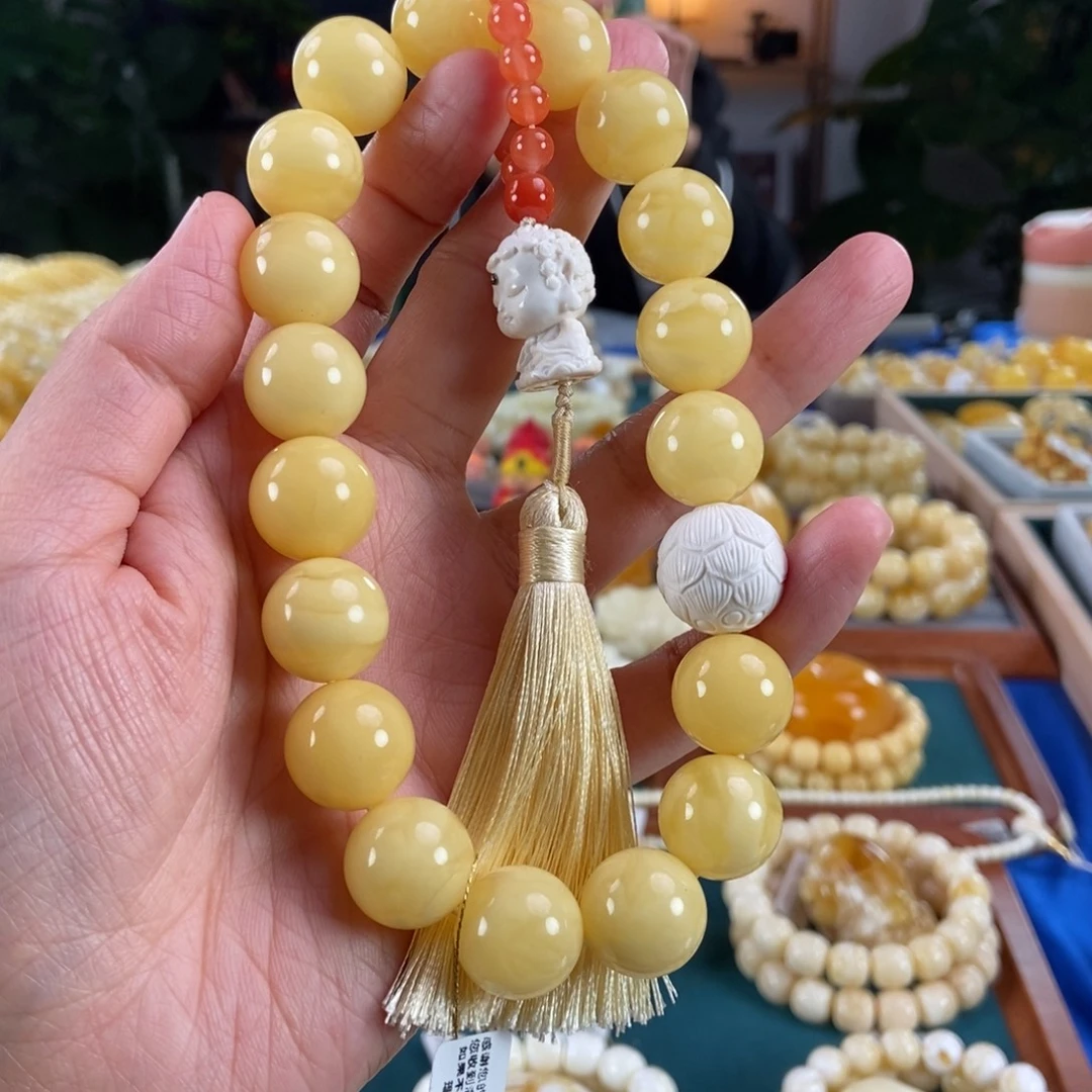 琥珀未镶嵌珠宝奇石16同料圆珠手持57.3