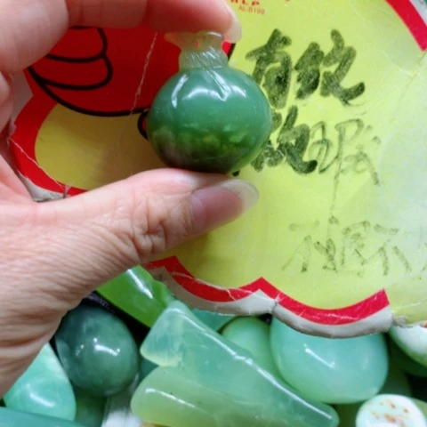未镶嵌蛇纹石玉手把件