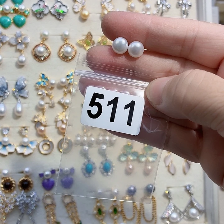 麻***。淡水珍珠耳饰合金