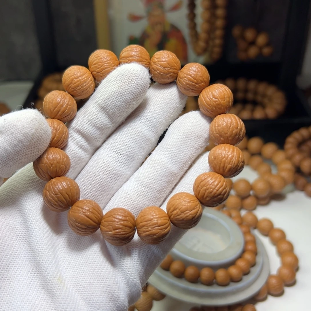 ****.猴头核桃吊坠15凤羽手串