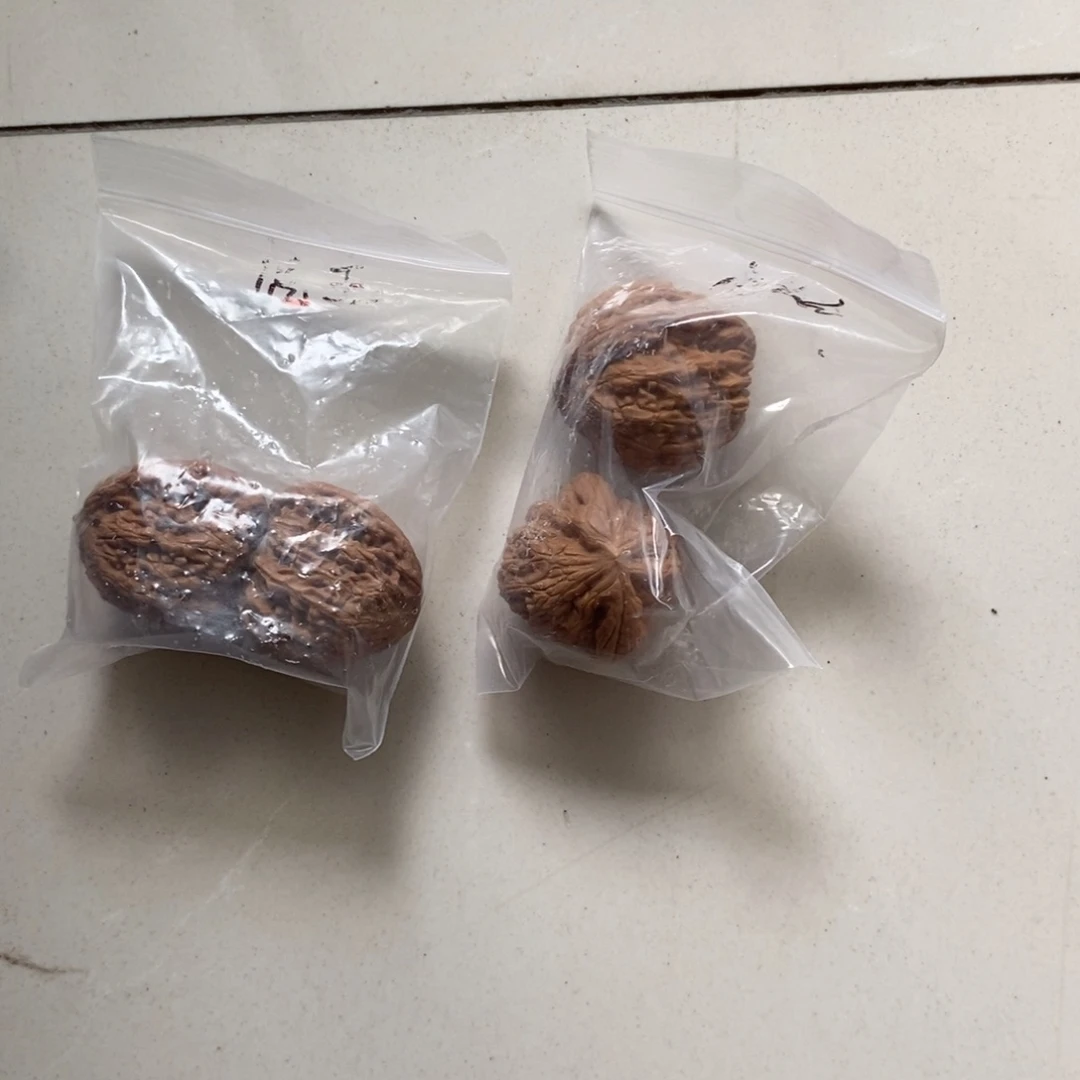 文玩核桃吊坠虎头王有瑕疵团