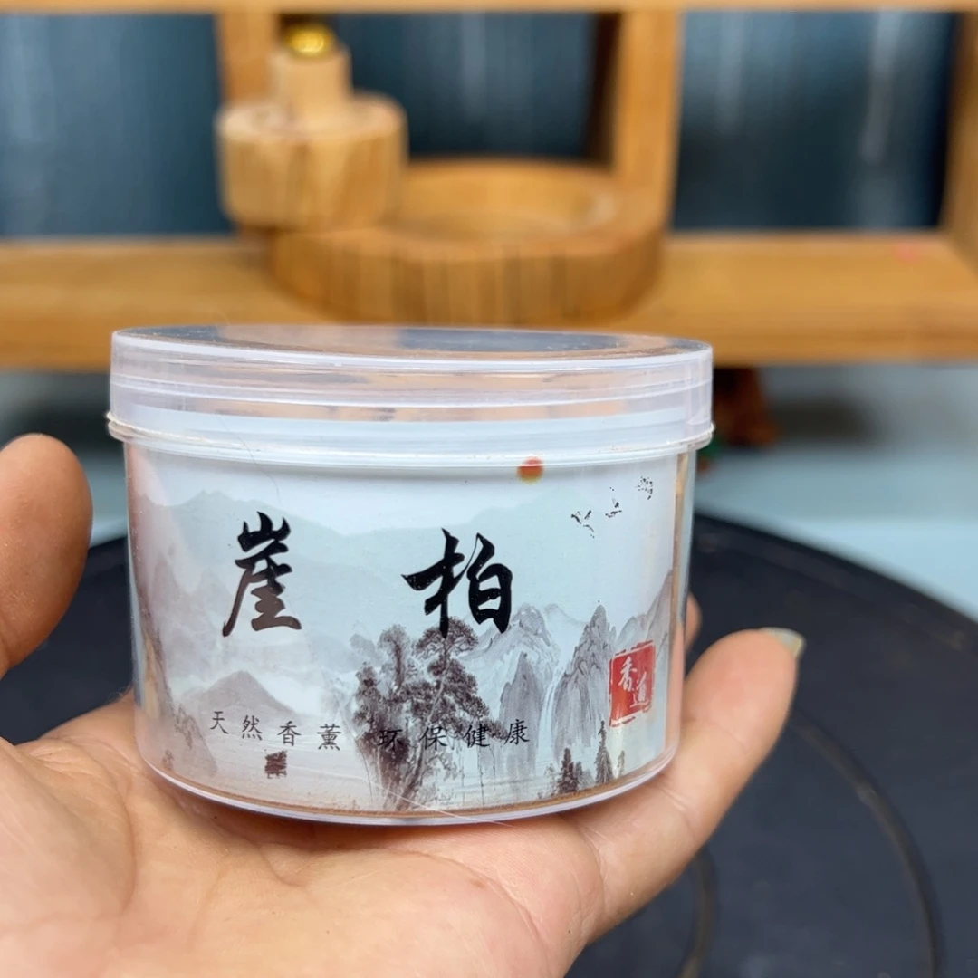 语***昕木崖柏1盒倒流香手把件