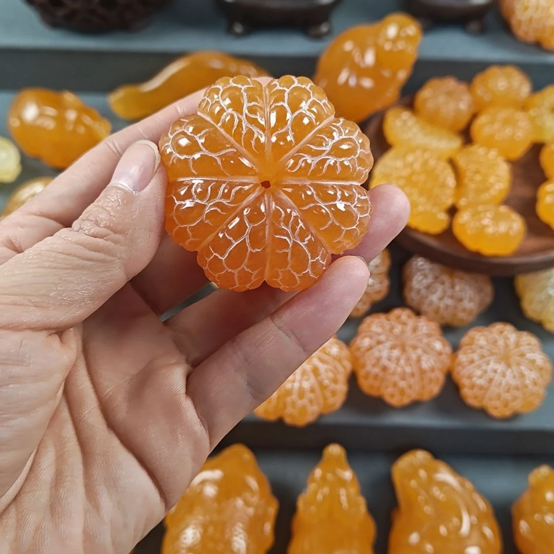 南***子石材天然原石手工雕刻橘子