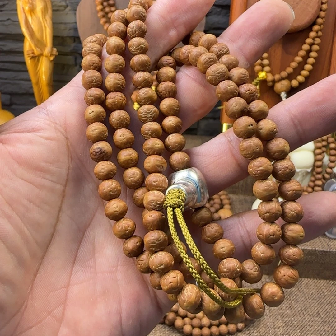 瞅****凤眼菩提吊坠酸枣核手串