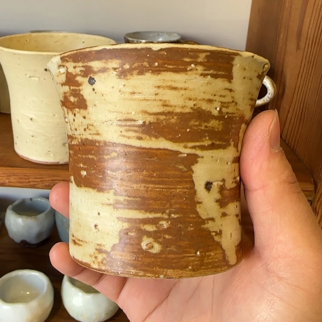 手作粉引奶黄手握杯