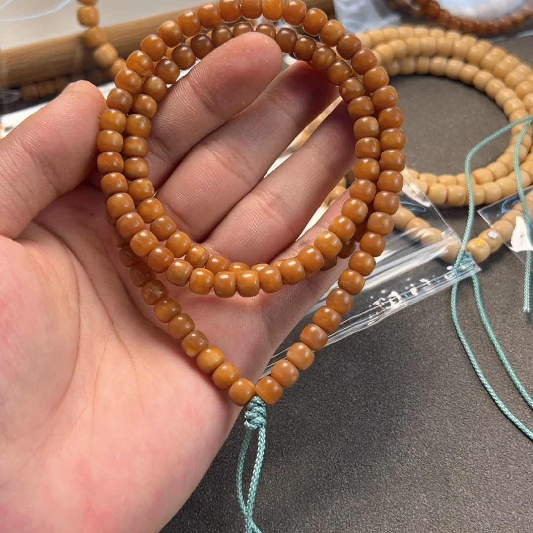 菩提根/象牙果吊坠龙脊全玉化7×6老型108