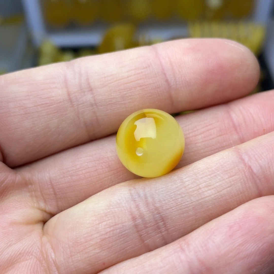 蜜蜡珠宝奇石未镶嵌梁*锤圆珠一颗约14.6mm