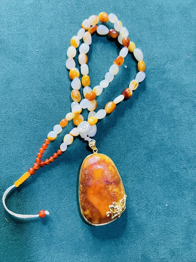 项链吊坠قاشتېشى مارجانلىق