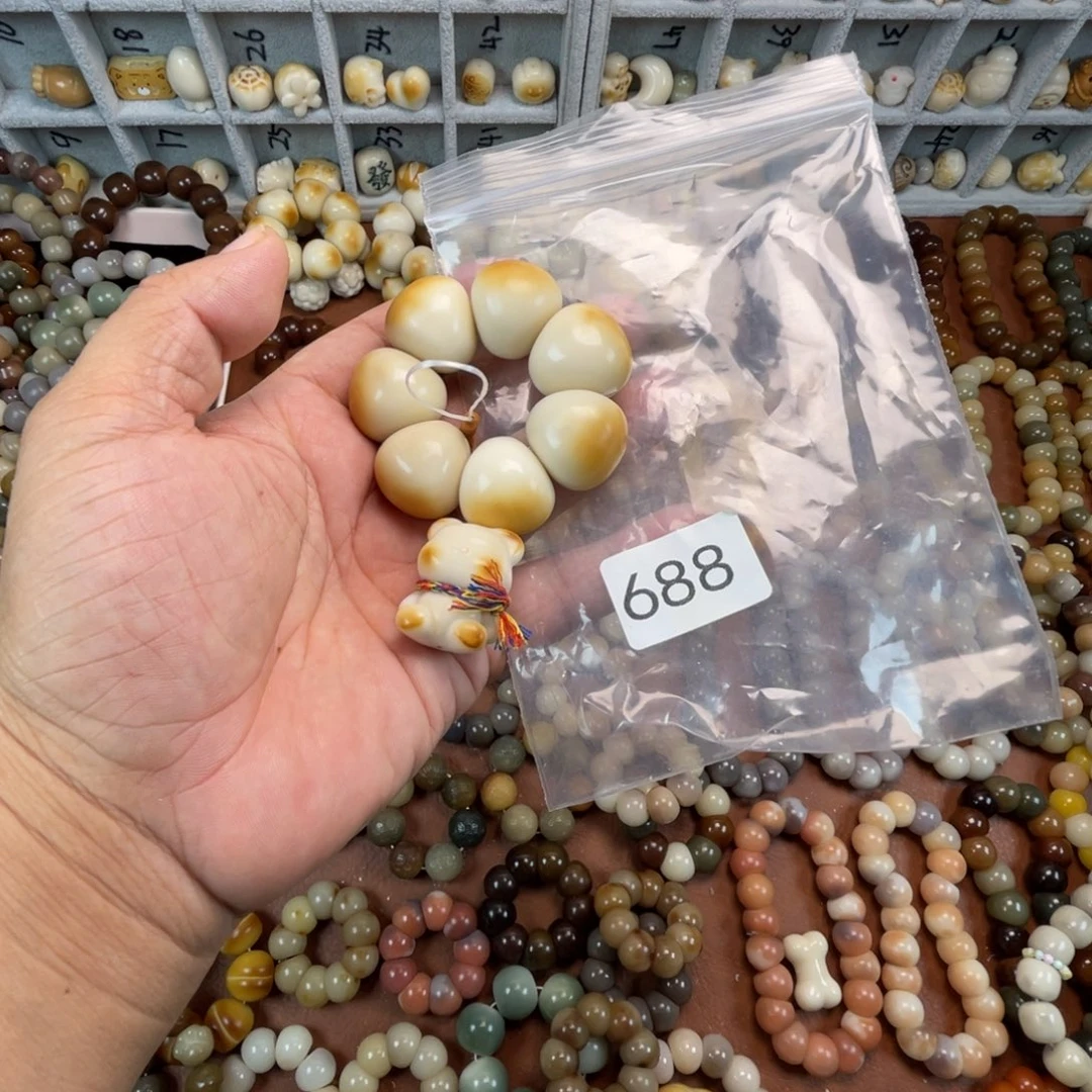 以***名吊坠菩提根/象牙果