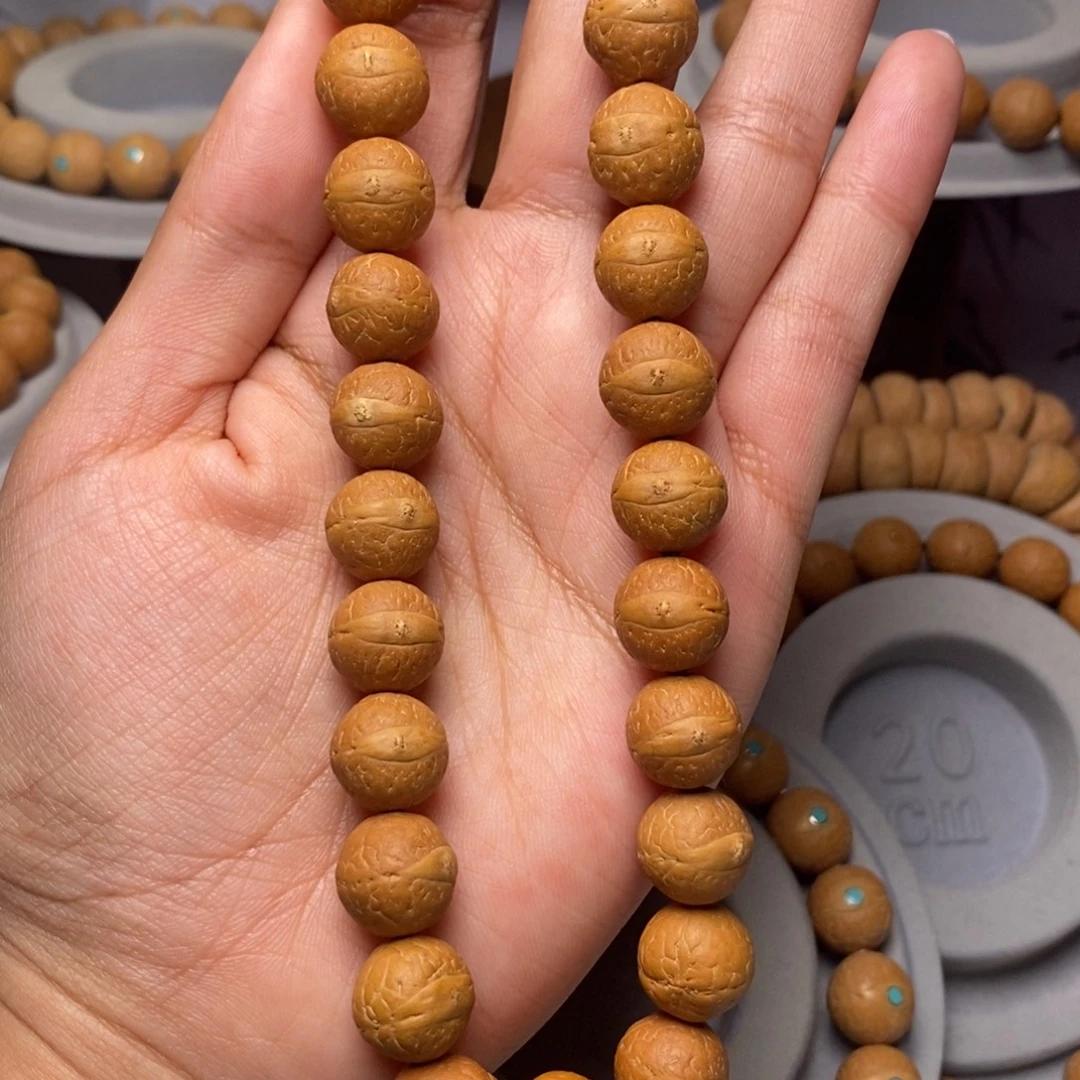 凤眼菩提吊坠手持