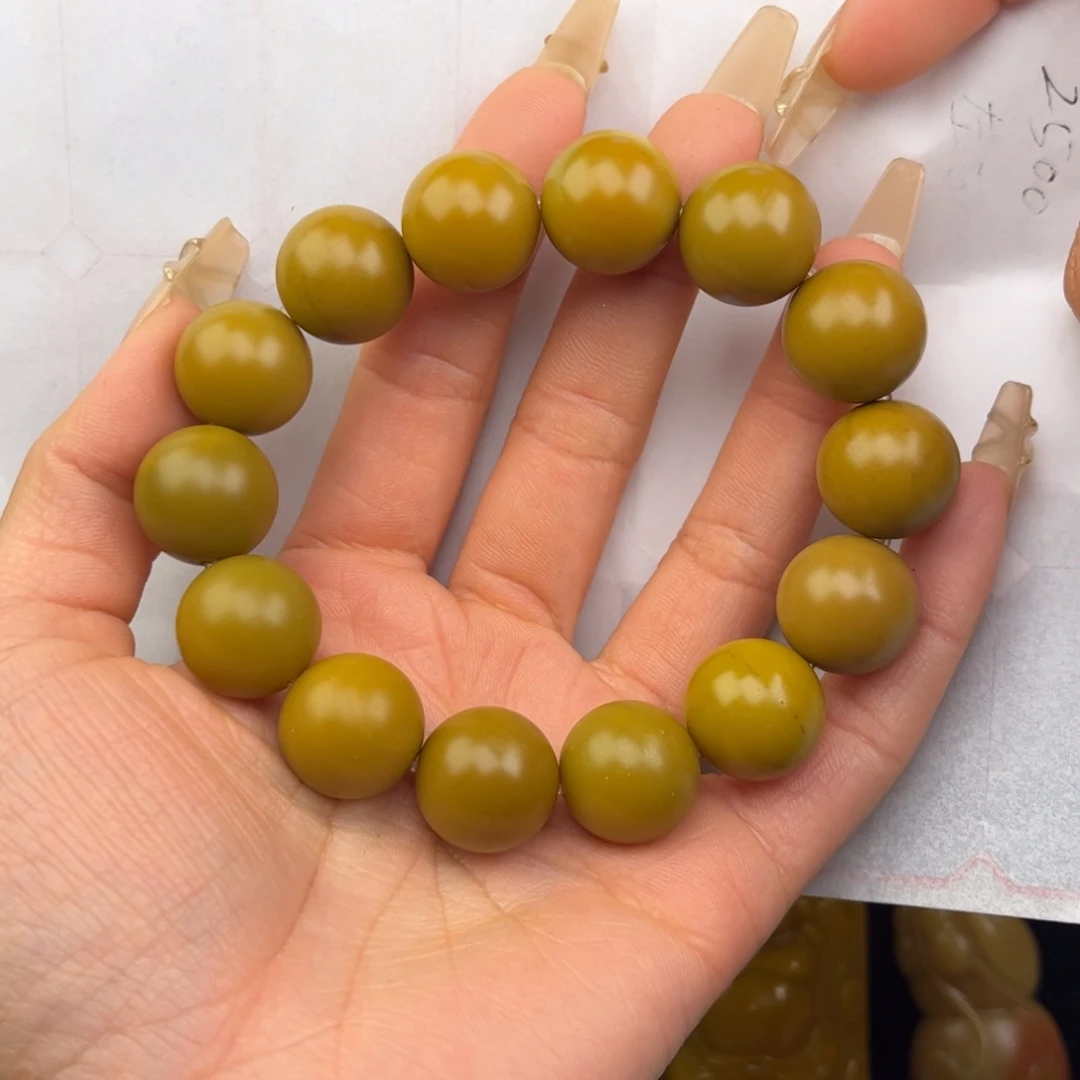 石英质玉未镶嵌黄蜡石吊坠慎*