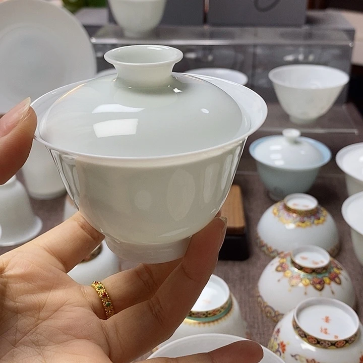 盟***龙微瑕山月闲高温超薄胎内模印双龙戏珠盖碗