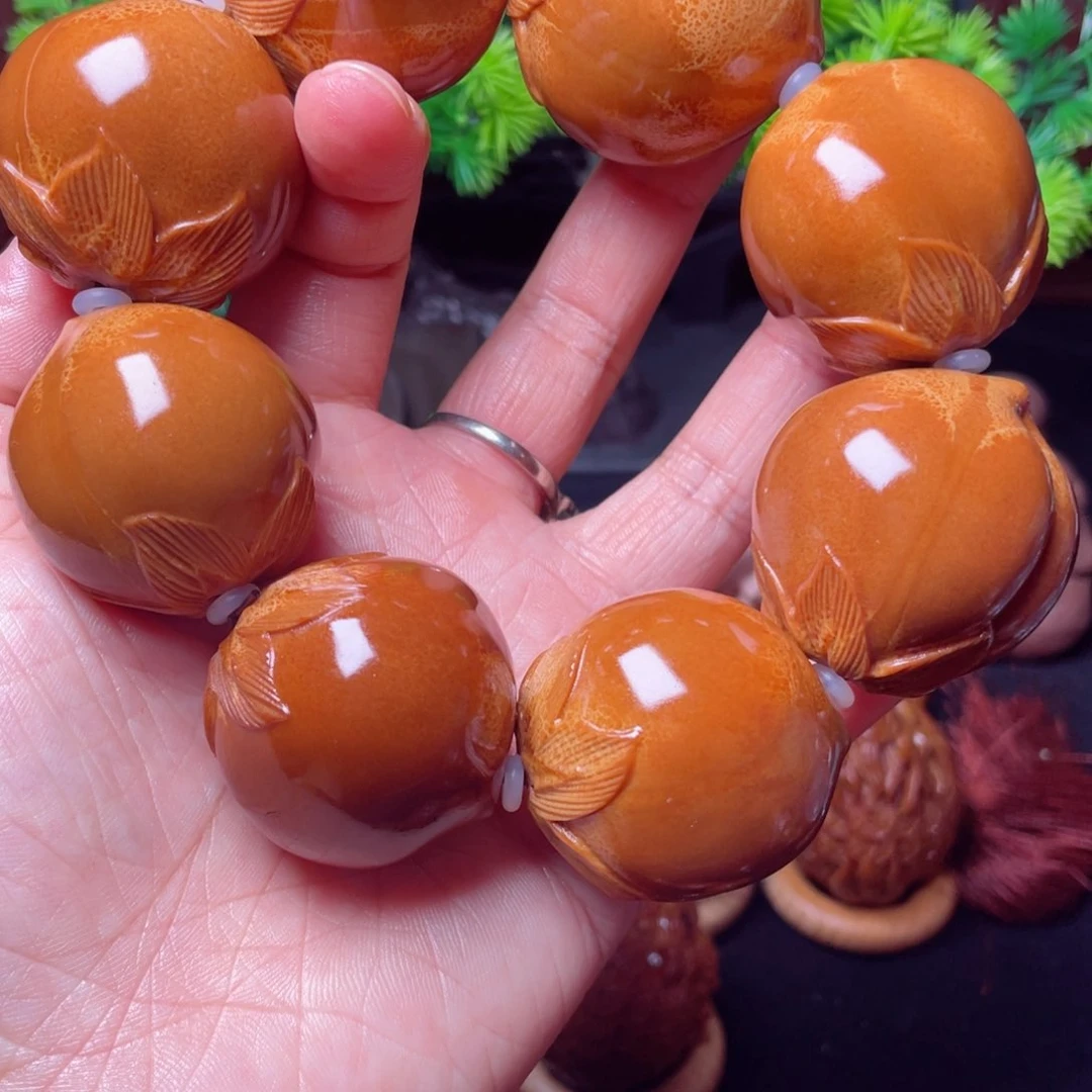 【闪购商品】橄榄核把件35左右寿桃手持