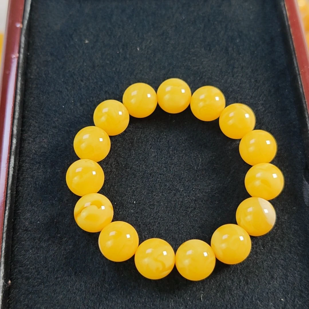 手串蜜蜡未镶嵌同料手串14m。
