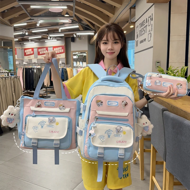 书包小学生书包女高颜值初中生少女拼色双肩包中学生轻便减负背包