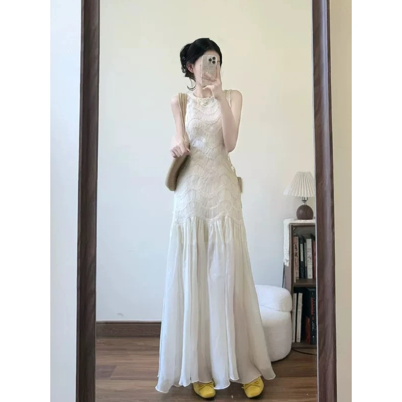 高级感蕾丝度假风连衣裙女2025新款独特超好看小众设计无袖长裙子