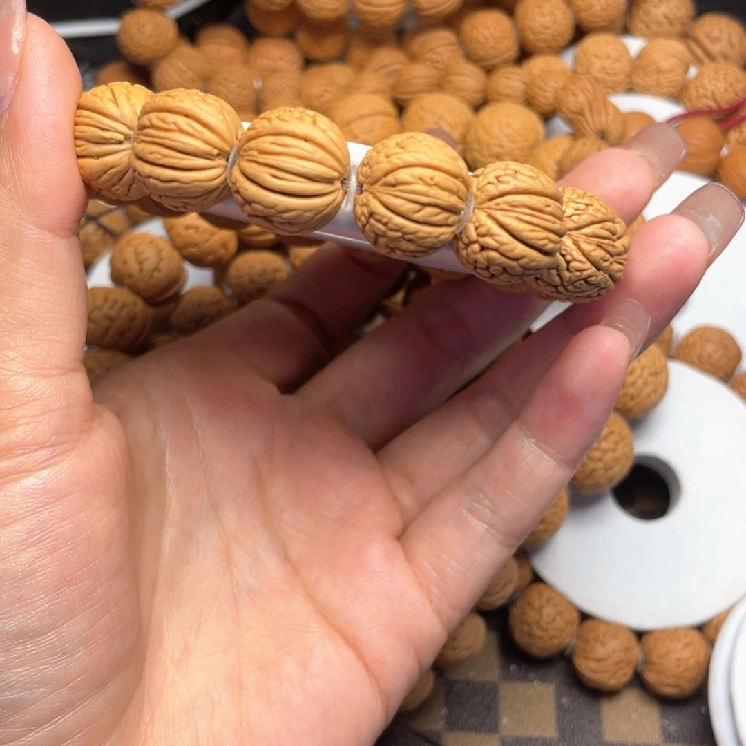桃木為**留桃核手串15+铁扇
