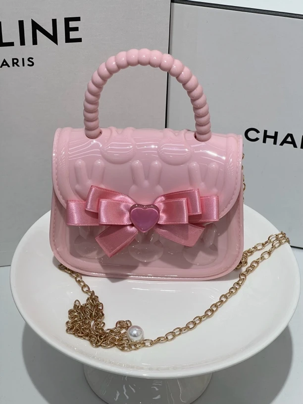 粉色爱心蝴蝶结包包包夹子