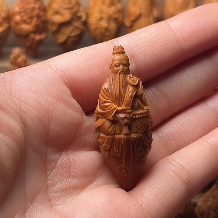 调***鱼橄榄核吊坠橄榄核