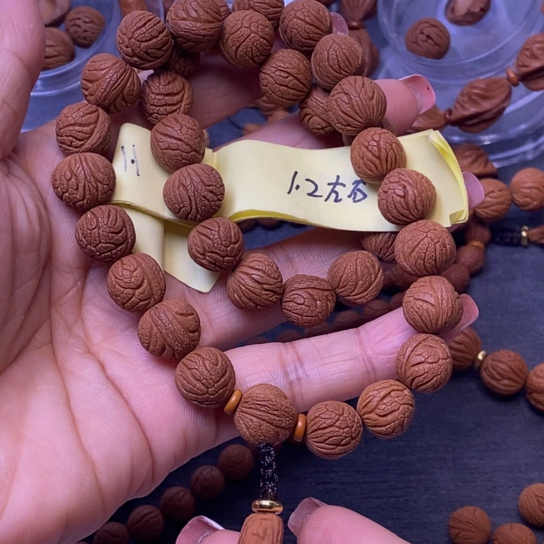 军***秦岭龙纹桃核35颗