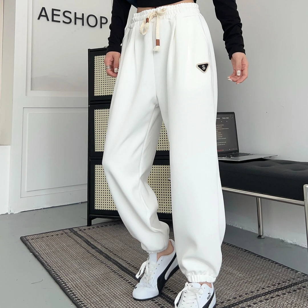 K230秋季新款时尚韩版百搭字母三角标女士休闲运动卫裤25-129