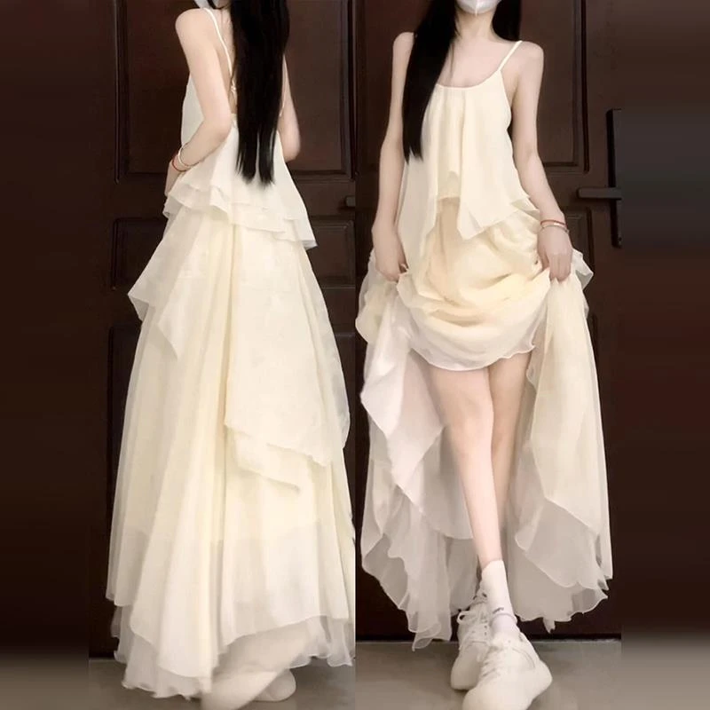 高级感法式白色吊带连衣裙子女装夏季2025新款海边度假不规则长裙