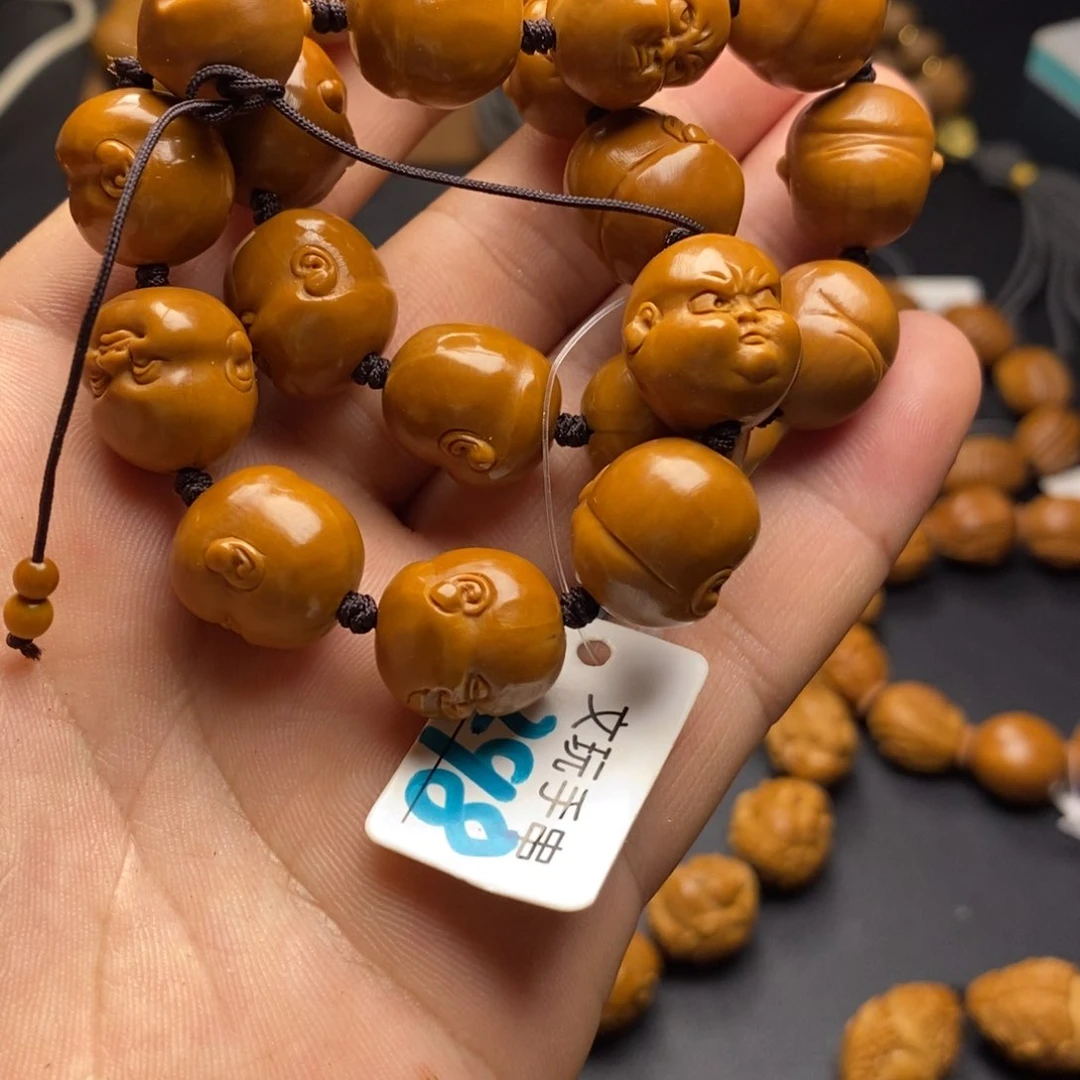 橄榄核手串/手链披****治百态手持