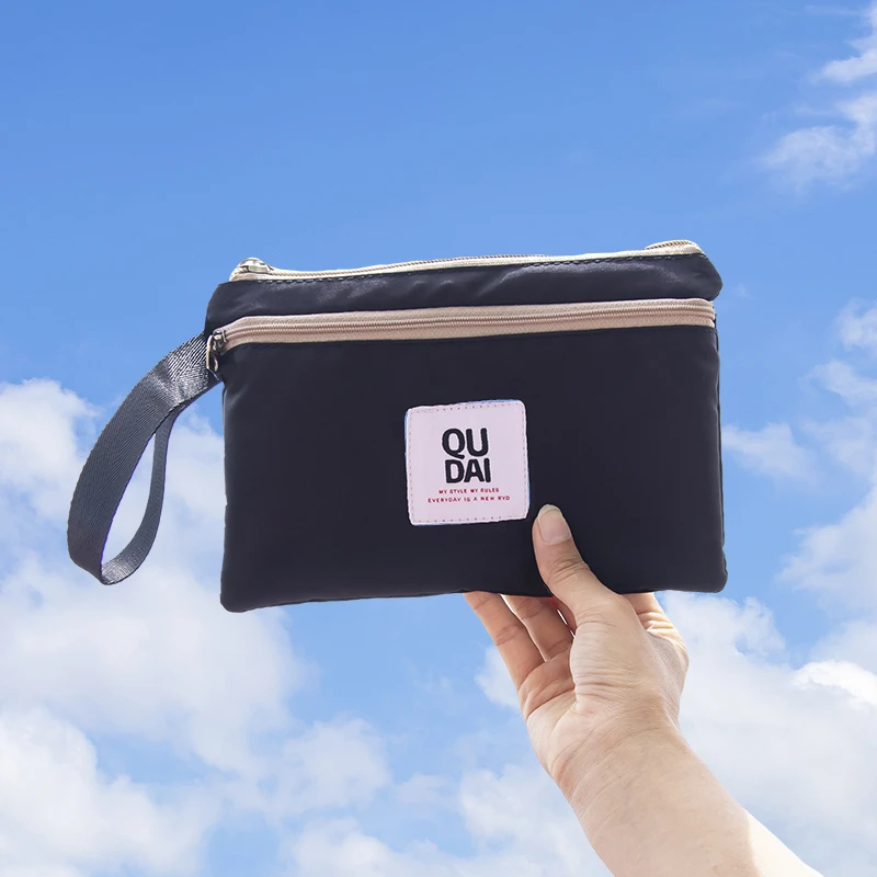 手拿包放手机包女2025新款装钥匙门禁散步小布包拉链男士手机袋