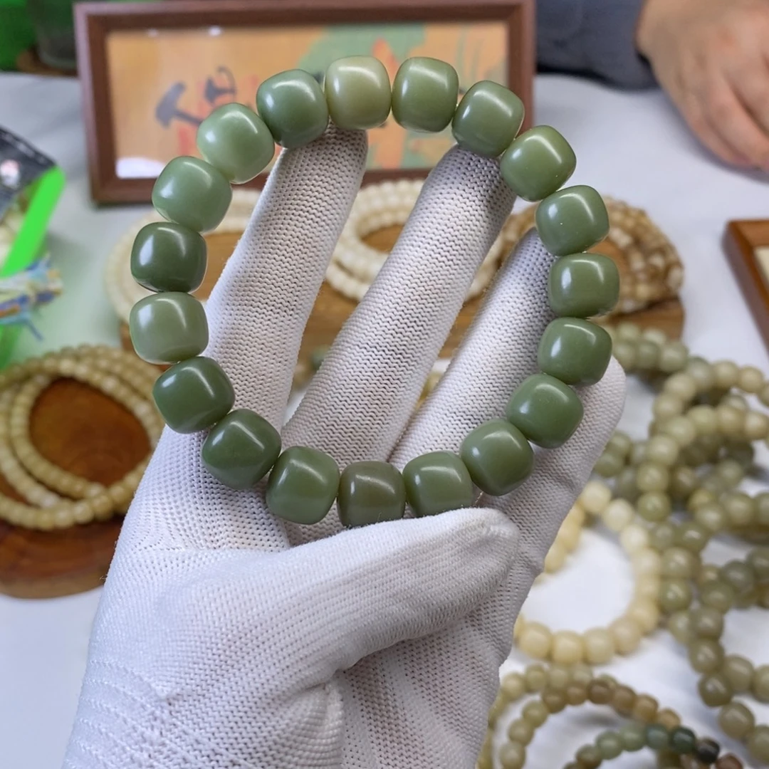 歌***，手串菩提根/象牙果酒