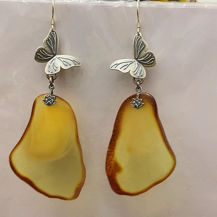 谭***卷琥珀银S925镶嵌耳饰琥珀