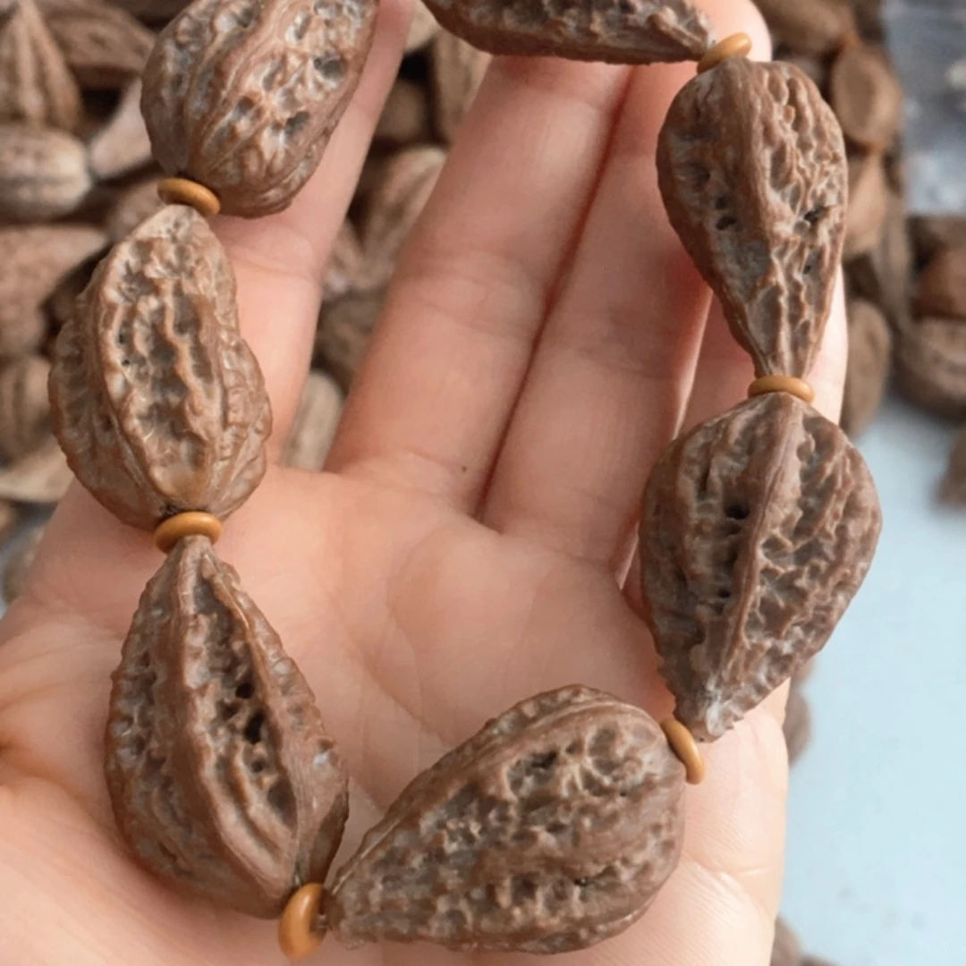 你****你文玩异形秋子手串