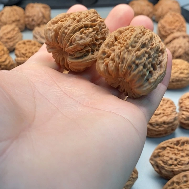 蓝***飘桃核吊坠丑南疆拉丝纹