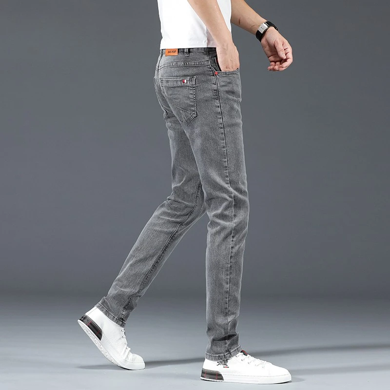 香港高端灰色牛仔裤男2025夏季新款修身小脚韩版百搭休闲弹力长裤